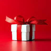 A small gift with a red bow.